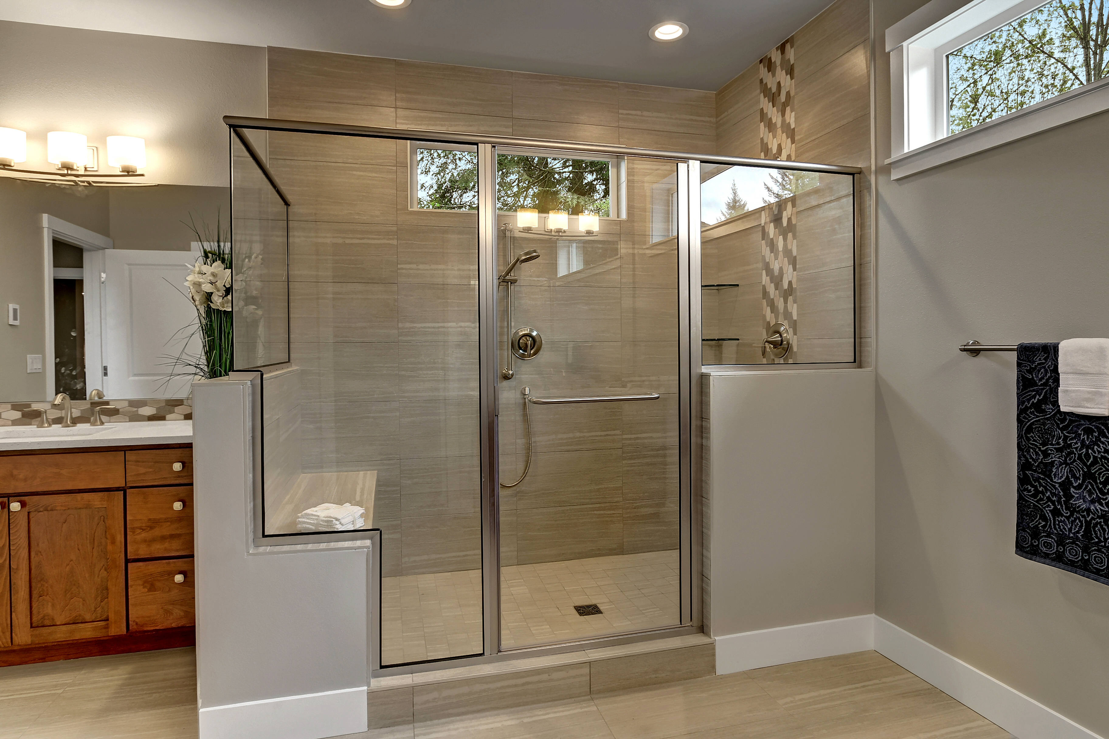 Master walk-in oversized shower with bench