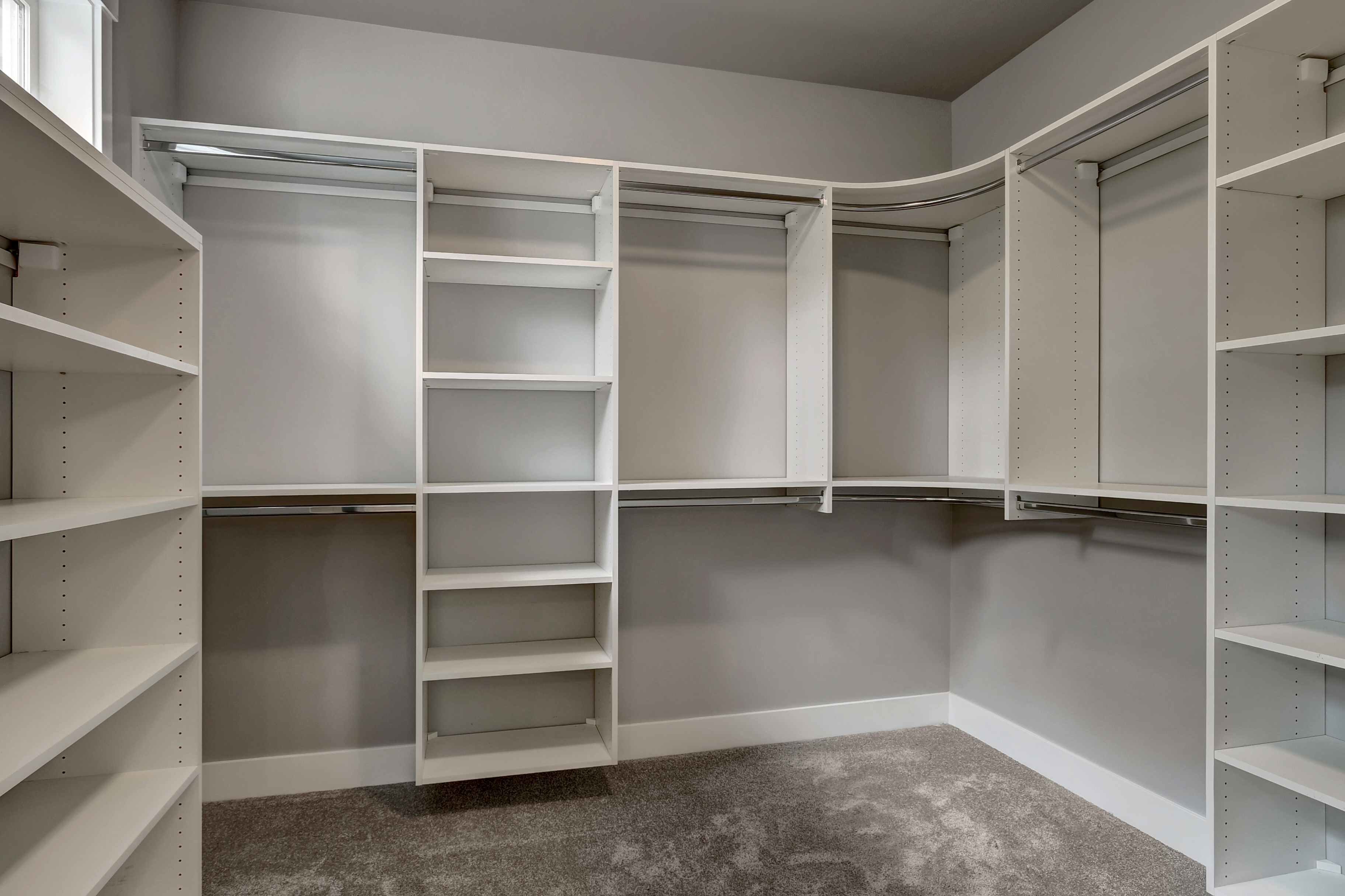 Master closet with melamine built-in shelving system closet organizer