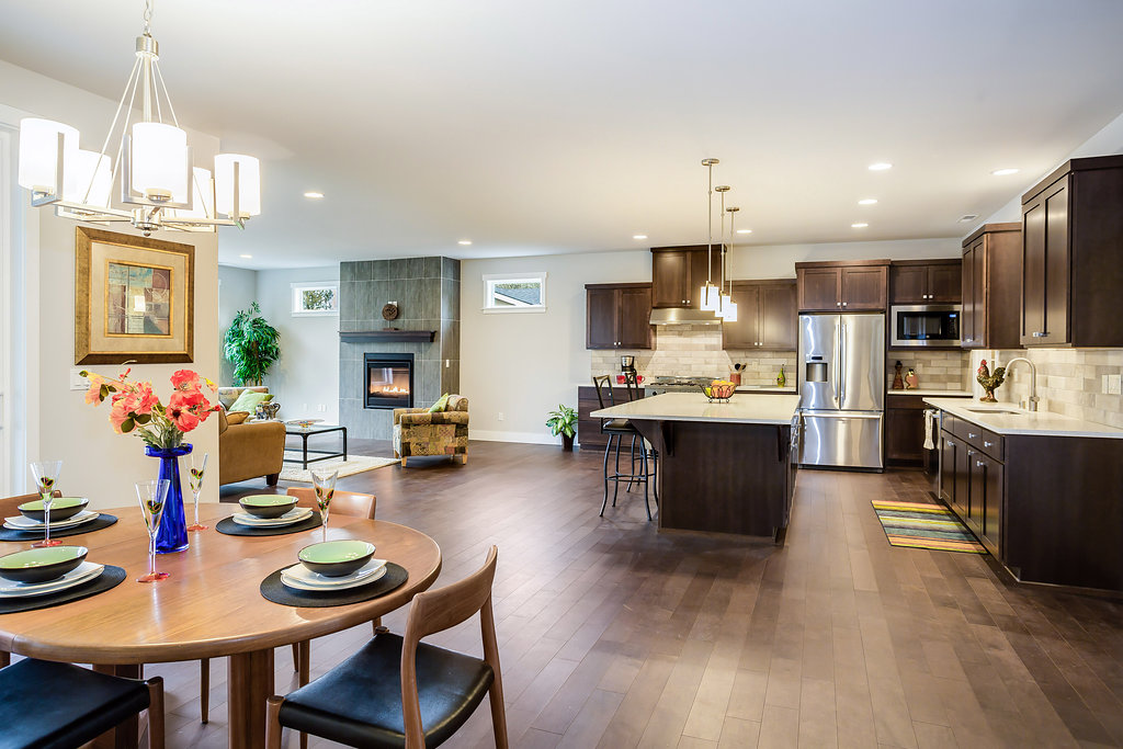 Open floorplan looking from dining into kitchen